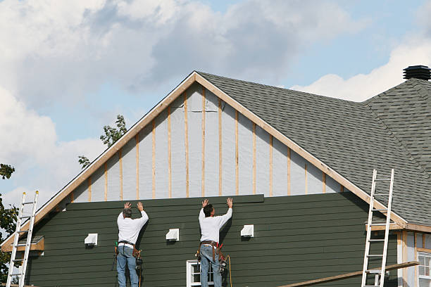 Professional Siding Contractor technician working in Reedsville, PA